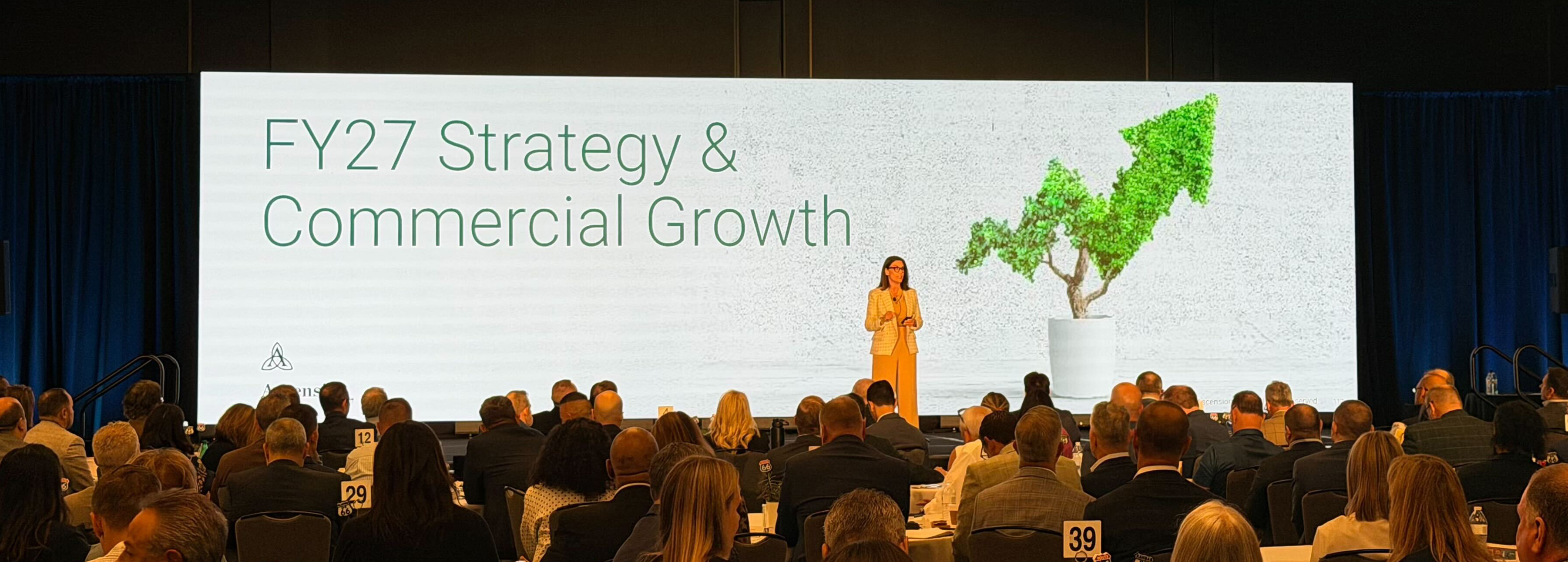 FY27 Strategy and Commercial Growth presentation on stage at leadership conference
