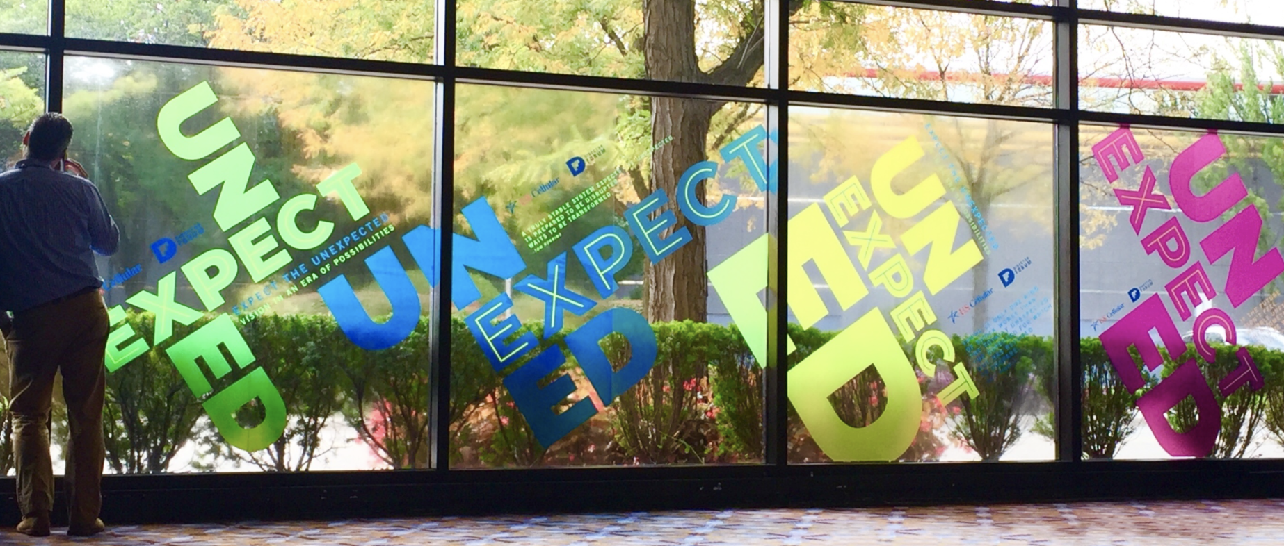 UNEXPECTED window clings at a U.S. Cellular leadership conference